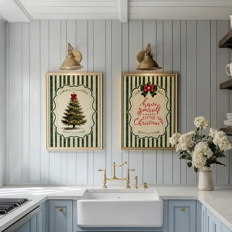 May include: Two rectangular wall art prints featuring a green and white vertical striped background. One print displays a decorated Christmas tree with a red bow, while the other features the text Have yourself a merry little Christmas in red.