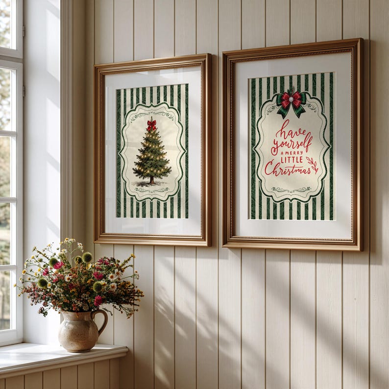 May include: Two framed wall art prints featuring a green and white vertical striped background. One print displays a decorated Christmas tree with a red bow, while the other features the red text Have yourself a merry little Christmas.