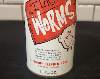 Il s'agit d'une canette de soda vintage des années 1970, de la marque « J'aime les vers », à la cerise.
