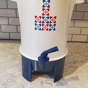 Vintage Regal Ware Poly Perk  20-cup plastic coffee percolator with red and blue motifs.