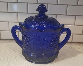 Cobalt blue Mosser Glass lidded jar with grape and cable pattern.
