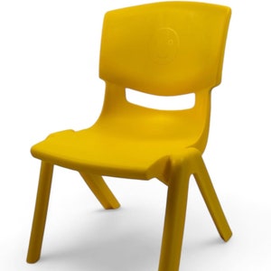 May include: A bright yellow plastic chair with a simple design. The chair has a rounded back and a wide seat. The chair has four legs that are angled outwards.