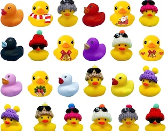 May include: A collection of 24 colorful rubber duckies, some wearing hats and others with festive decorations. The ducks are in various poses, including sitting, standing, and swimming.