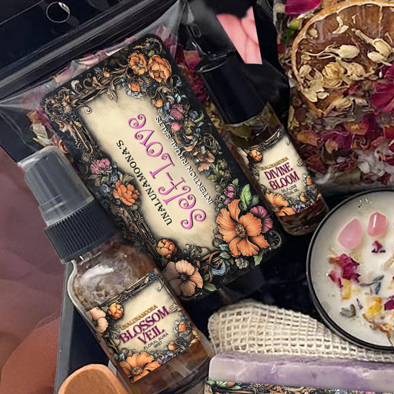 May include: An assortment of self-care products, including a box labeled "Self-Love" with floral designs, a spray bottle marked "Blossom Veil," and a bottle of "Divine Bloom" oil. The items are arranged with a candle and dried flowers.