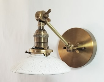 Style#103 Adjustable wall sconce available in a variety of sizes