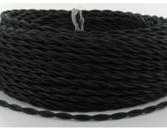 May include: A spool of black twisted electrical wire. The wire is wound tightly around the spool, creating a thick, textured coil.