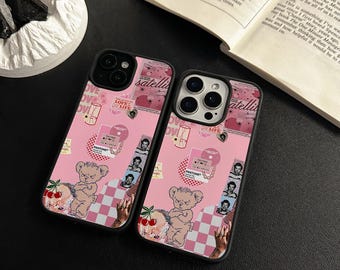 May include: Two pink phone cases with a collage design. The cases feature a repeating pattern of a teddy bear, cherries, and a checkered pattern. The design also includes images of people, lipstick, and the words "LOVE" and "LIFE".