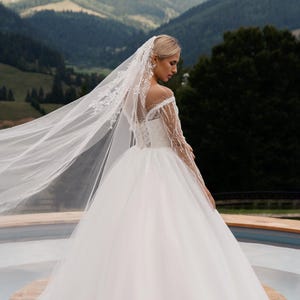 Hand-Beaded Princess Ball Gown: Long Sleeve Tulle Wedding Dress