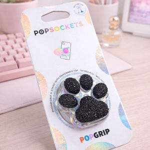 Soporte PopGrip con forma de pata de purpurina negra: Soporte holográfico para teléfono