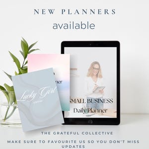 May include: An advertisement for new planners. The image shows a tablet displaying a "Small Business Daily Planner" and two physical planners, one labeled "Lucky Girl planner." The text reads "New Planners available" and "The Grateful Collective."