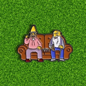 Golden Geezers – Golf Ball Marker – Classic Simpsons Humor for the Green!