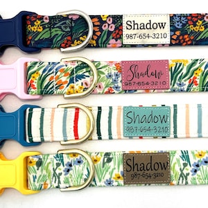 May include: Four dog collars with floral and striped patterns. Each collar has a gold metal D-ring and a plastic buckle. Each collar has a brown leather tag with the name "Shadow" and a phone number.