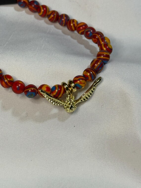 Bracelet- Harry Potter theme with Natural Red Malachite Stone beads with golden Snitch