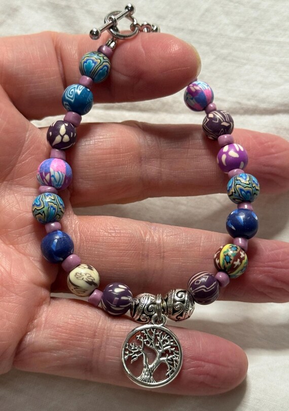 Bracelet- Muliticolored Silicone beads with tree of life charm