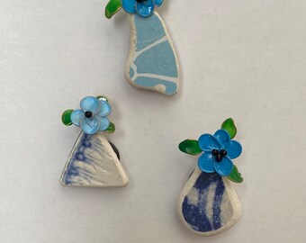 Refrigerator magnets with sea pottery and handmade blue flowers. Set of 3. Sweet gift for any occasion. Enjoy flowers everyday!