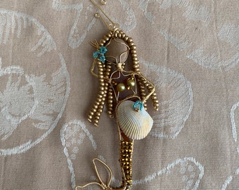 Sea Glass Mermaid with beads and gold wire.