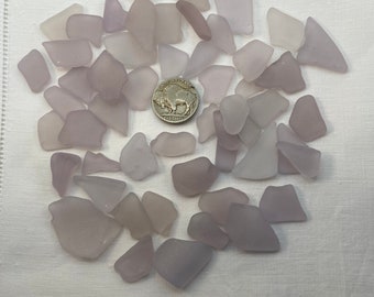 Sea glass, genuine lavender sea glass.  Collected by me on San Francisco Bay. Various shades of lavender sea glass.