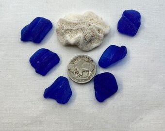 Sea glass, genuine surf tumbled blue and a piece of Mexican coral reef.