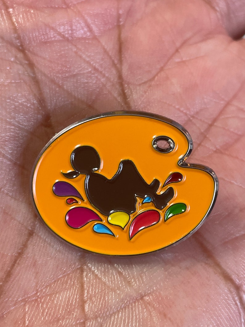 Jump In Studio enamel pin image 2