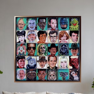 May include: A framed artwork featuring a grid of painted portraits of iconic movie characters. The artwork includes characters from various genres, with a gold frame and a teal background for each portrait. The artwork is displayed in a living room setting.
