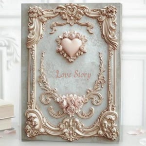 May include: A decorative book cover with a light blue background and ornate gold-colored trim. The cover features a pink heart and a bouquet of pink roses. The words "Love Story" are written in a cursive font.