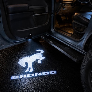 Proyector de luz LED de bienvenida para puerta Bronco / Juego de 2 con sensores de luz y distancia / Compatible con FORD Bronco