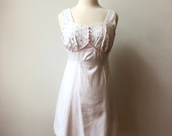 1960s White Eyelet Dress by Candi Jones, Sleeveless 60s mini dress, White dress w/ pink trim, pink button front, 60s white eyelet mini dress