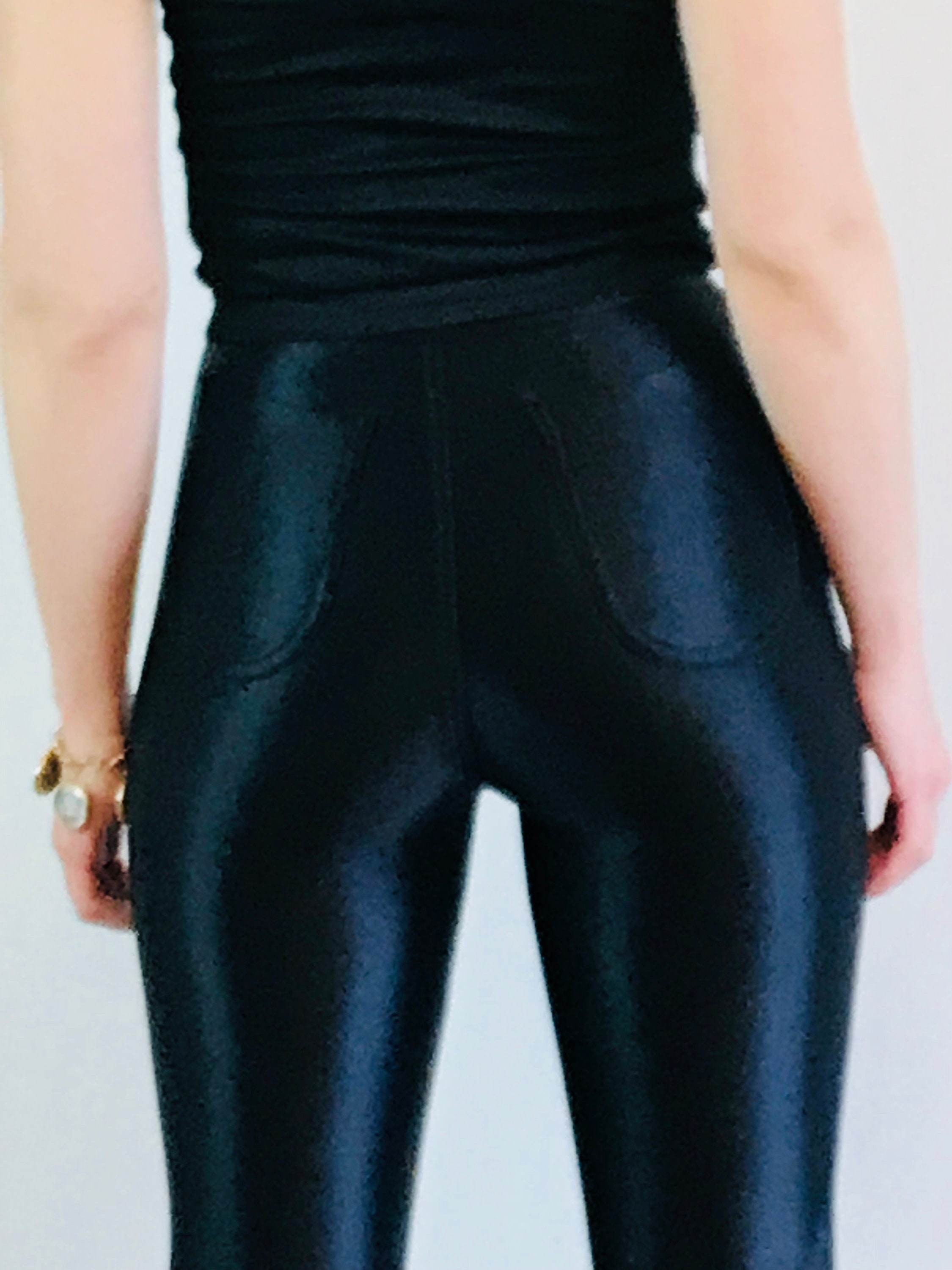 shiny black trousers