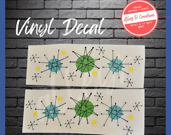 May include: Two rectangular vinyl decals featuring a repeating pattern of black starburst lines, solid light blue and green circles, and small yellow dots. The design is printed on a white background, showcasing a mid-century inspired graphic motif.