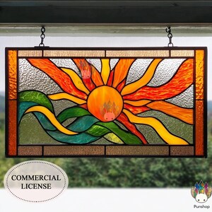 May include: Stained glass panel showing a sunset over waves. The sun is orange and red, the waves are green and yellow. The panel is framed in a dark brown border and hangs from chains. The panel measures approximately 40 cm x 20 cm.
