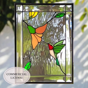 May include: Stained glass window panel with a design of two hummingbirds and flowers in orange, green, yellow, and red. The panel has a textured background and a black border. The words "COMMERCIAL LICENSE" are printed on the bottom.
