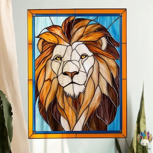 May include: A stained glass window featuring a lion's head with a detailed mane in shades of orange, brown, and gold. The lion's eyes are a bright yellow, and its face is white with black markings. The background is a blue and white stained glass pattern.