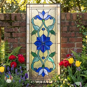 May include: A rectangular stained glass panel with a floral design. It features blue and white flowers, green leaves, and teal accents. The panel is framed in a dark metal and set against a brick wall. The words "DIGITAL PATTERN" are at the bottom.