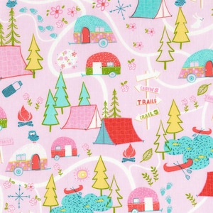May include: A pink fabric with a repeating pattern of camping-themed illustrations. The pattern includes pink, blue, green, and yellow campers, tents, trees, owls, and signs that say "Cabins", "Trails", and "Happy Trails".