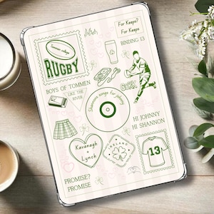 May include: A cream-coloured tablet case featuring green illustrations and text. The design includes the word "RUGBY", a rugby player, a skirt, and a shamrock. The text "HI JOHNNY HI SHANNON" is also present. The case has a clear border.