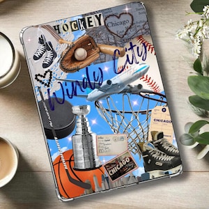 May include: A tablet case featuring a collage of Chicago-themed sports imagery, including a hockey puck, skates, a baseball glove, a basketball, a trophy, and an aeroplane, with the text "HOCKEY", "Windy City", and "CHICAGO" printed on it.