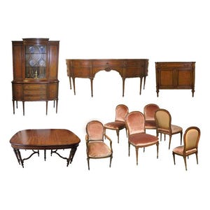 May include: A collection of antique wooden furniture, including a corner cabinet, a long sideboard, a small cabinet, a dining table, and several upholstered chairs. The furniture is a warm brown color.