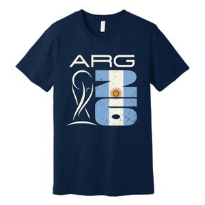 May include: Navy blue t-shirt with a graphic design featuring the letters "ARG" above the number "16" in a distressed style. The number incorporates the Argentinian flag colors and a sun emblem. A white abstract design is on the left.