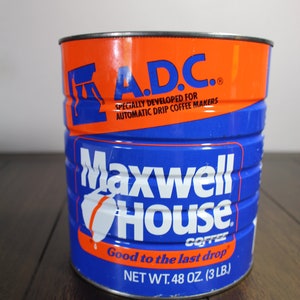May include: A blue and orange can of Maxwell House coffee. The can is labeled "A.D.C. Specially developed for automatic drip coffee makers" and "Good to the last drop". The can contains 48 ounces (3 pounds) of coffee.