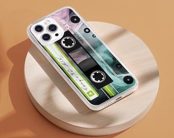 May include: A clear phone case with a retro cassette tape design. The case features a green, blue, and pink abstract design with the text "Hoon's. 80 Mix" and "Know that I was your girl" on the cassette tape.