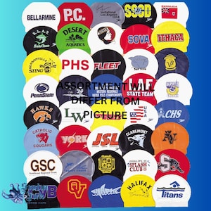 May include: Assortment of colorful swim caps with various logos and text, including "Bellarmine", "PC", "Desert Aquatics", "State", "Sova", "Ithaca", "PHS", "Fleet", "Penn State", "Hawks", "Catholic Cougars", "York", "JSL", "Claremont", "GSC", "CVB", "QV", "Phillips Splash Club", "Halifax", "Titans", and "Assortment Will Differ From Picture".