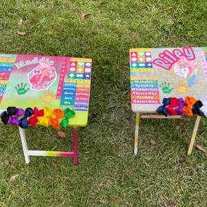 Customized, for any grade level learning table.Includes But Not LIMITED…
(traceable) name w/ dri erase marker Character Numbers ABC’s Shapes
 Days of the week Months of the year Left to Right hand interaction Color hair bow interaction characters