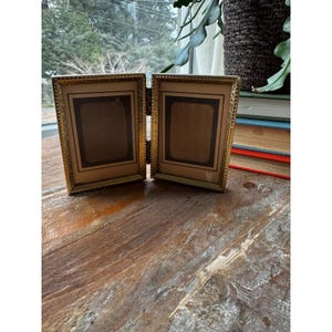 May include: A rustic wooden sign with the text "Welcome to our porch" in white lettering. The sign features a distressed finish and a simple, inviting design, perfect for outdoor decor.