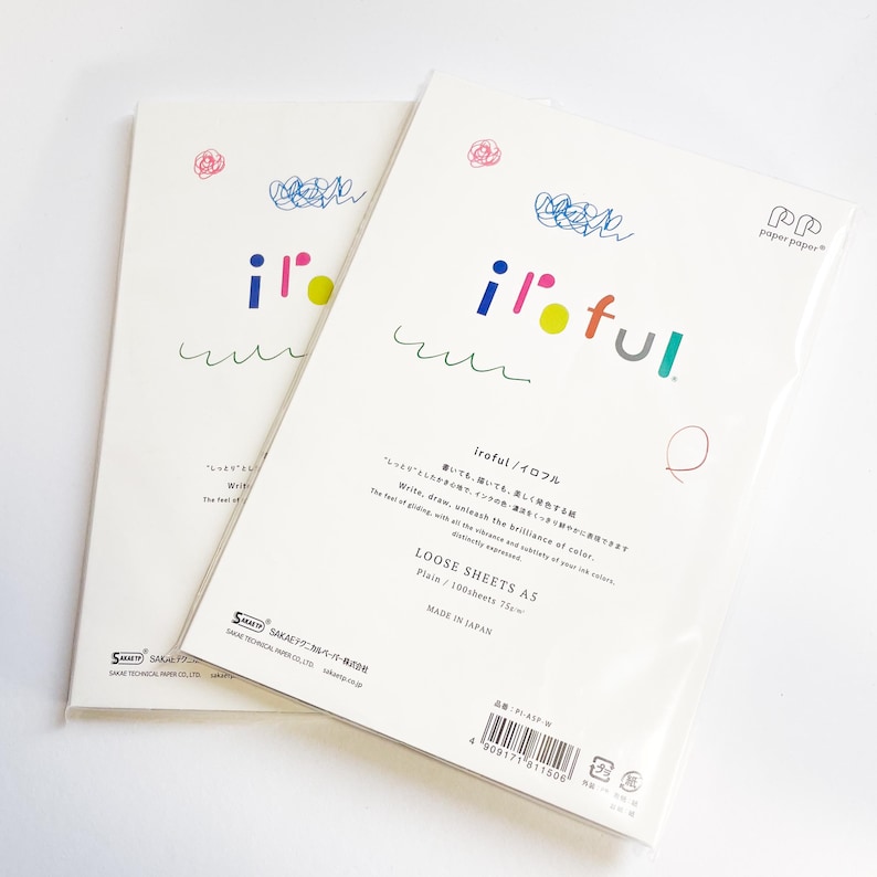 May include: Two packs of A5 loose sheets of paper. The packaging is white with colorful text and illustrations. The text "iroful" is in a playful font. The paper is plain and contains 100 sheets.