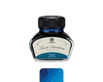 May include: A glass bottle of Octopus Fluids fountain pen ink in the color Petrol. The label features the text Octopus, Feinste Schreibtinte, Fountain Pen Ink, Petrol, and 30 ml - 1 fl.oz. A blue ink swatch is displayed below the bottle.