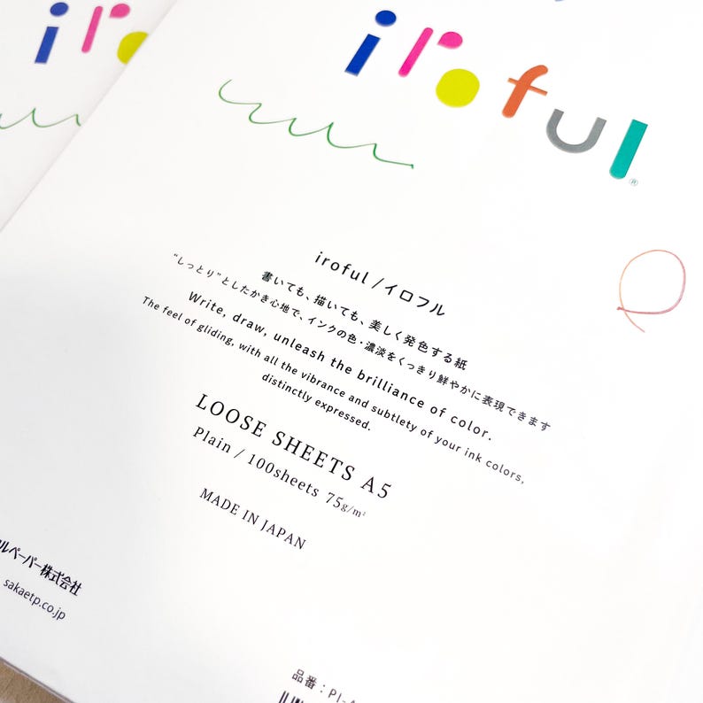 May include: White A5 loose sheets of paper with the text "iroful" in colorful letters. The paper has Japanese text and English text that reads "Write, draw, unleash the brilliance of color." The paper is plain and has a weight of 75g/m&sup2;.