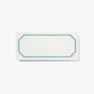 Könnte beinhalten: Ein weißer rechteckiger Notizblock mit einem blauen achteckigen Rand und liniertem Papier. Der Notizblock hat den Text "Shhh..." in der rechten unteren Ecke.