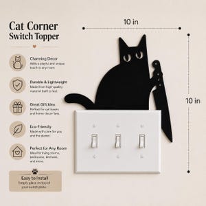 May include: A black cat-shaped light switch topper holding a knife, positioned above a white triple toggle switch plate. The design measures 10 inches by 10 inches. The text Cat Corner Switch Topper is visible along with installation details.
