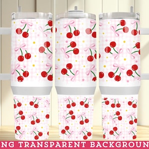 May include: White tumbler with a cherry pattern. The design features red cherries with green stems and pink bows on a pink and white checkered background. The tumbler has a white handle and a silver lid.