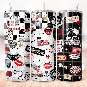 May include: Three stainless steel tumblers with straws, decorated with stickers and text. The designs include a black and white checkerboard pattern, hearts, lips, and phrases like "My TBR is 90% Smut" and "He Falls First."